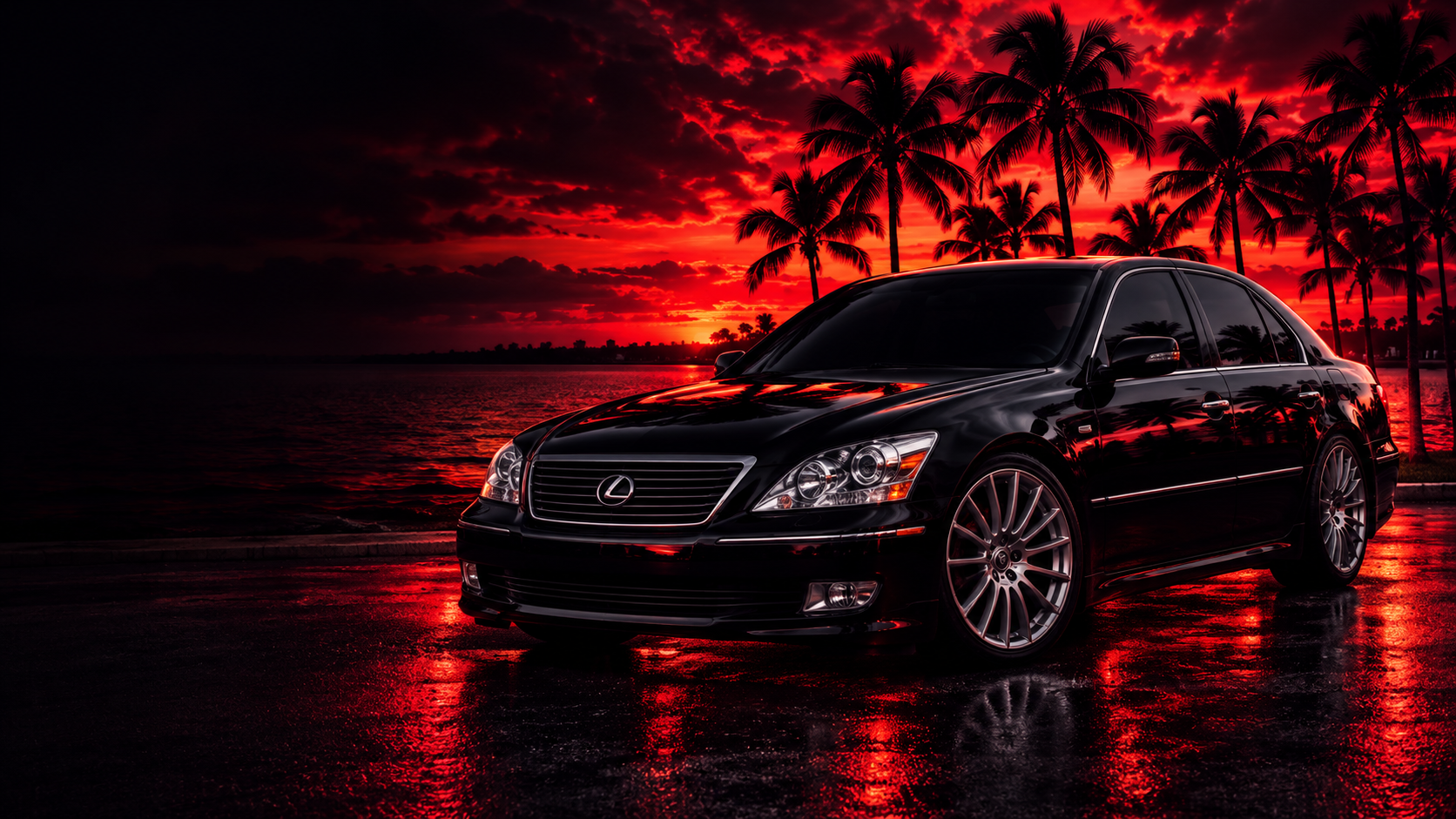Black Lexus sedan with silver wheels at sunset